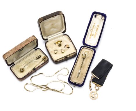 Three gold stick pins, a 9ct gold stud set, 9ct gold bar and masonic fob, 15g, three items cased 