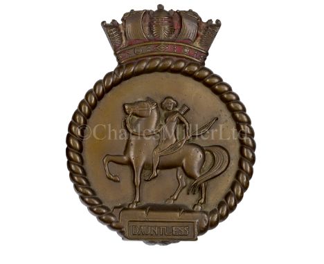 AN UNOFFICIAL 5IN. GUN TOMPION FROM H.M. LIGHT CRUISER DAUNTLESS, CIRCA 1919cast in brass and stamped behind 'No. 5 Gun' and 