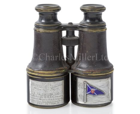 AN ATTRACTIVE PAIR OF PRESENTATION BINOCULARS, CIRCA 1894unsigned, leather-covered tapering tubes with Galilean optics, focus