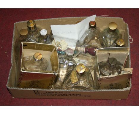 A box of vintage whisky bottles