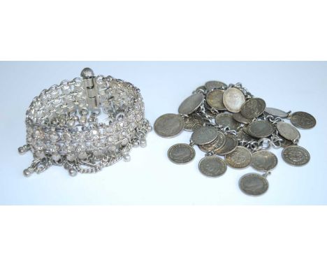 A vintage chain link coin bracelet; together with an Indian white metal bracelet (2)