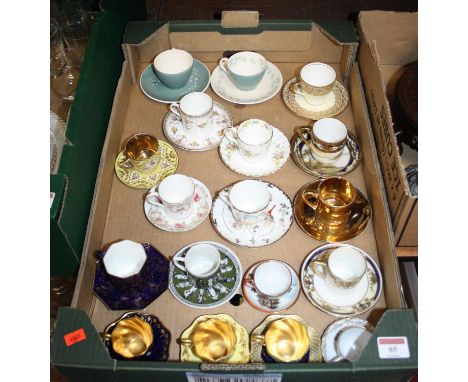 A collection of various porcelain coffee cans and saucers to include Noritake and WedgwoodSome marks and losses to gilding.Ot