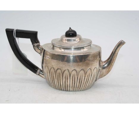 A Victorian silver bachelors teapot, of half-reeded oval form with ebonised finial and handle, 10.1oz 