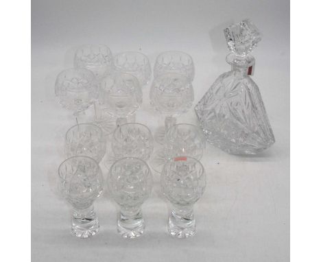 A suite of six crystal wine hocks; together with a decanter and six further glasses 