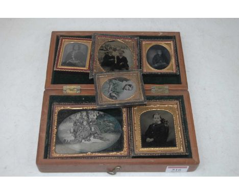 A collection of Victorian daguerreotypes, being portrait examples, in associated mahogany boxAge related marks to all , howev