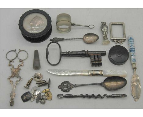 A collection of miscellaneous items, to include an Edwardian silver pipe tamper, the handle in the form of an owl, having gla