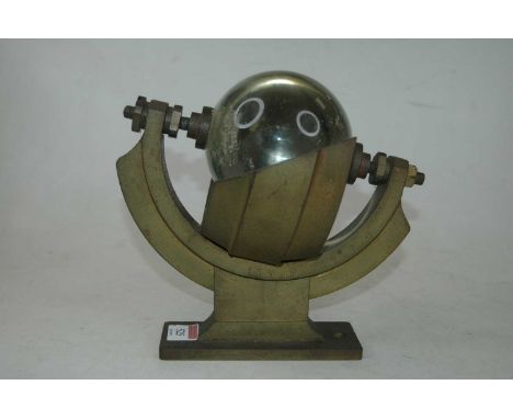 A Campbell-Stokes type sunshine recorder, or heliograph, the glass sphere within an iron mount with outer scale, on rectangul