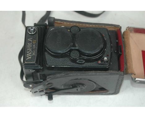 A YTshika Mat-124G camera, in leather outer case