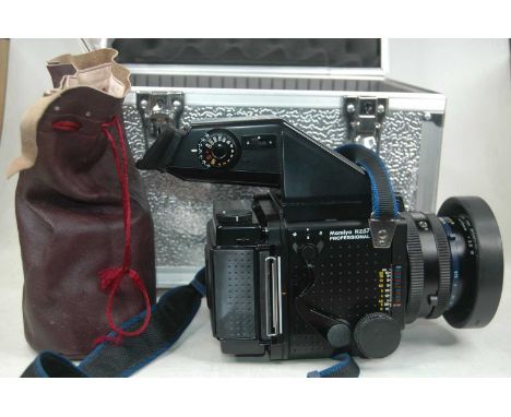 A boxed Mamiya RZ67 prism finder medium format camera, in travel case, with Mamiya Sekor F+50mm lens, one other lens and two 