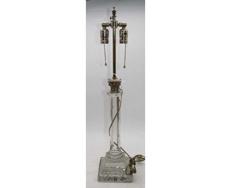 A reproduction resin table lamp in the form of a Corinthian column, h.73cm