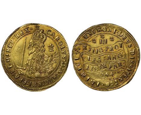 Charles I (1625-49), gold Triple Unite, 1644, crowned armoured half-length figure of King left, holding upright sword and pal