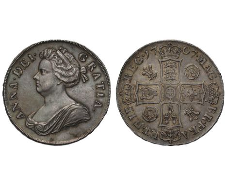 Anne (1702-14), silver Pre-Union Crown, 1707, roses and plumes reverse, first draped bust left, Latin legend and toothed bord