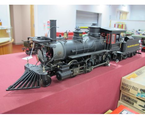 A 'G' Gauge American Outline 2-6-0 Locomotive and Tender by Bachmann, lack/yellow Pine Lumber Co. finish, spares/repair.