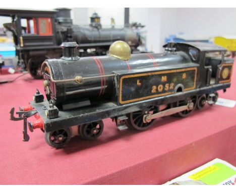 A 1920's Hornby "O" Gauge No 2 Tank, 0-4-0 clockwork, finished in LMS black, R/No 2052, overall good, minor signs of some pai