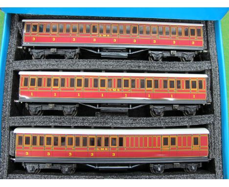 An Ace Trains "O Gauge Coach Set C1, comprising three LMS suburban coaches, very good, boxed.