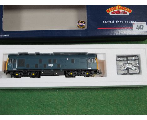 A Bachmann "OO" Class 25 Diesel Locomotive, finished in British Rail blue, couplings changed, boxed.