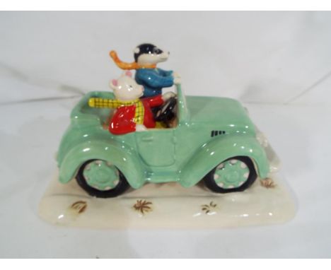 Royal Doulton - a limited edition Royal Doulton Rupert the Bear figurine entitled Rupert, Bill and The Mysterious Car #0979 o