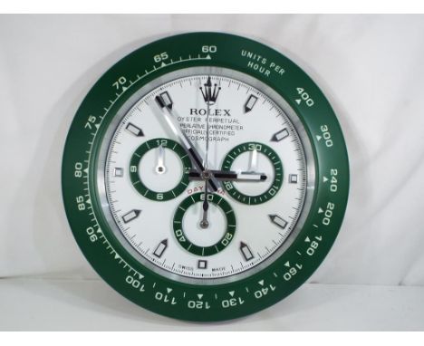 An advertising wall clock, approx      Est £100 - £120