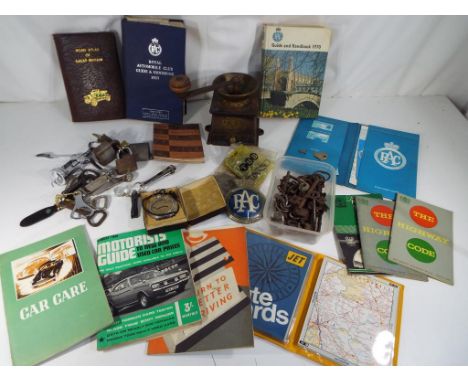 A collection of automobile memorabilia to include Johnstons Great British Road Atlas, The Royal Automobile RAC Collectors Clu