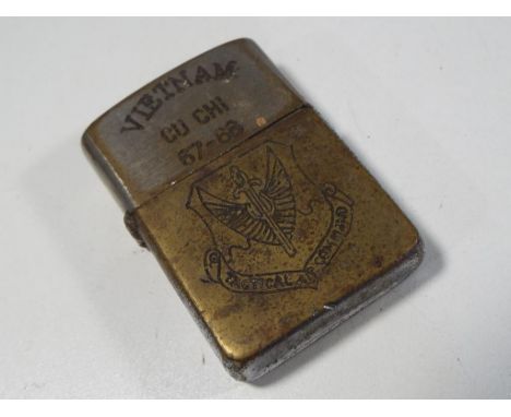 Vietnam / American war interest - a Zippo lighter inscribed Vietnam Cu Chi 67 - 68 inscribed verso we came because we believe