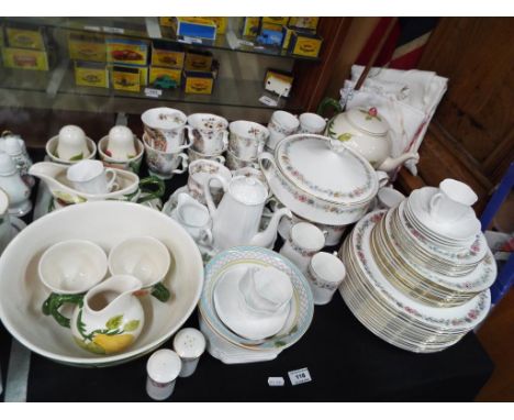 A large quantity of ceramic table ware, part tea services to include Paragon decorated in the Belinda pattern, Royal Doulton 