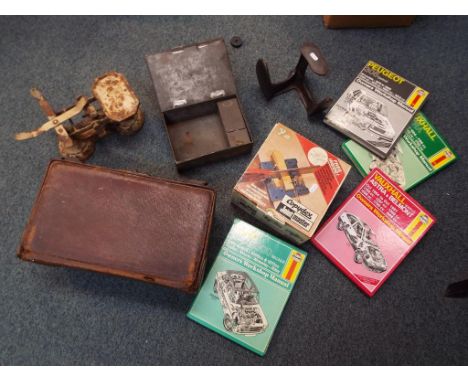 A good mixed lot to include a vintage leather suitcase, weighing scales, a Copydex Jointmaster, a quantity of workshop manual