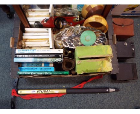 A mixed lot to include a Stubai Austrian ice axe, a quantity of rambling books to include Wainwright, metal ware, glass dish 