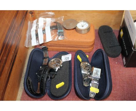 A travelling clock; a Pulsar wristwatch; rotary wristwatch; a Longines Automatic Heritage military watch