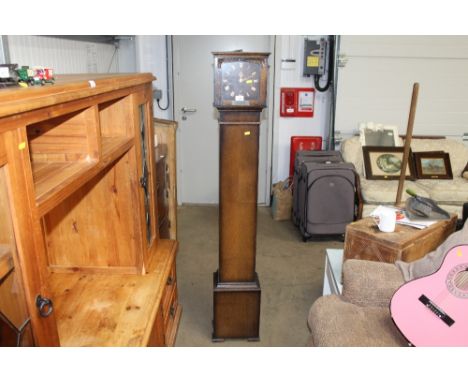 A Smiths oak cased grandfather clock with presentation plaque