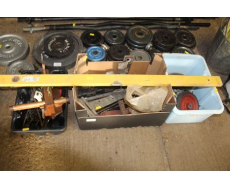 Three boxes containing various tools; fittings; wheels; spirit level etc.