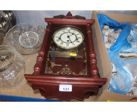 A modern three hole wall clock 