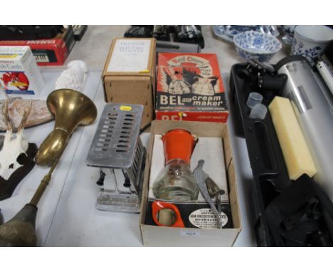 A cream maker and a toaster, sold as collectors item