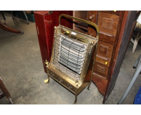 An Art Deco style brass electric fire, sold as collectors item