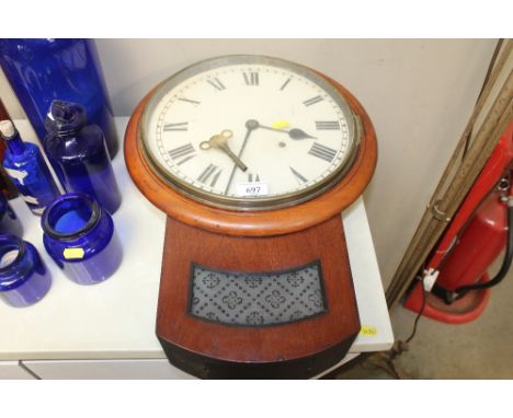 A Victorian mahogany cased two hole wall clock