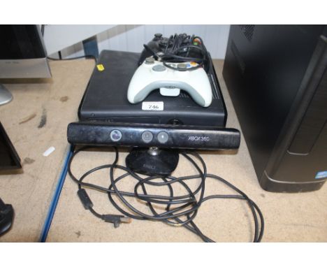 An X-Box360 games console with two controllers
