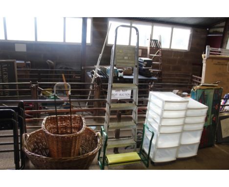An aluminium step ladder and a garden kneeler