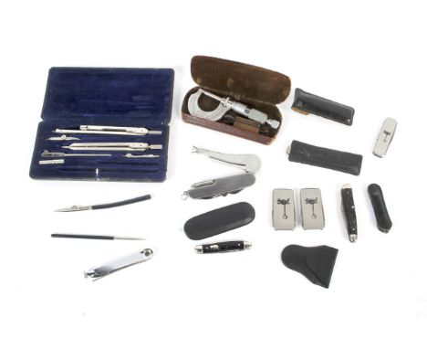 An assortment of pen knives, including American examples pipe knives and a case geometry instrument set.