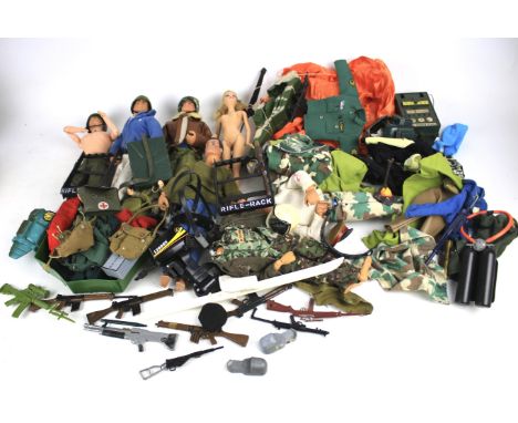An assortment of action man and accessories. Including a Palitoy example, various clothes, a model helicopter etc