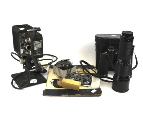 An assortment of camera equipment and electricals. Comprising a vintage Home Kodascope 8mm cine film projector, binoculars an