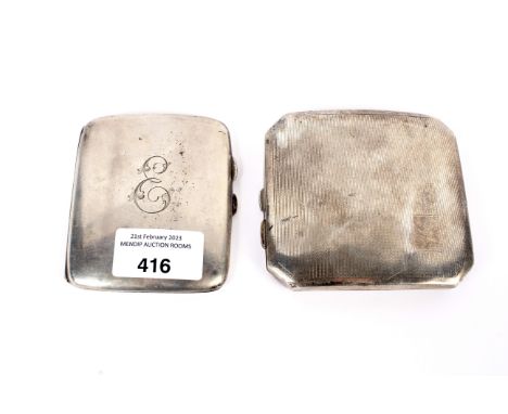 Two silver cigarette cases one with engine turned decoration. Both hallmarked for Birmingham weight 199 grams.