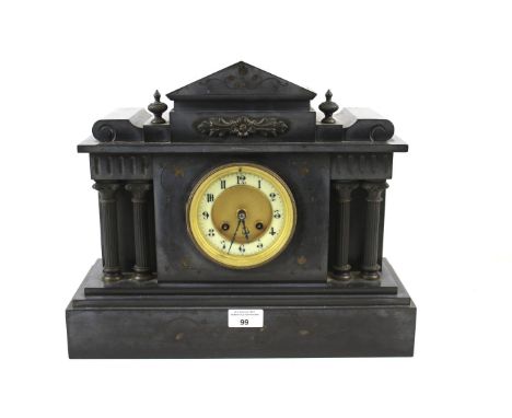 A Victorian black slate mantle clock. The dial with Arabic numerals, the case with architectural features including Corinthia