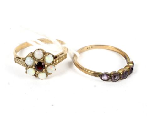 Two yellow metal rings. Comprising a garnet and opal cluster ring stamped '9ct Gold' and a five stone amethyst ring stamped '