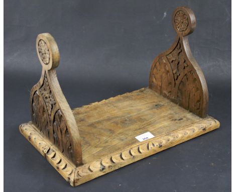 A 20th century oak tabletop book shelf. With carved and shaped details, L39cm