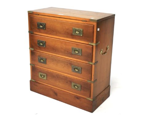 A yew wood campaign style chest of four drawers. With brass mounts and twin brass carrying handles, with fold over top, L61cm