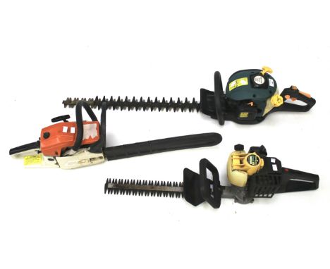 A petrol chainsaw and two hedge trimmers. One of the hedge trimmers by McCulloch