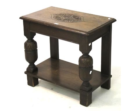 A Jacobean style oak hall table with single drawer. On carved baluster supports joined by a lower shelf, L74cm x D53cm x H68c