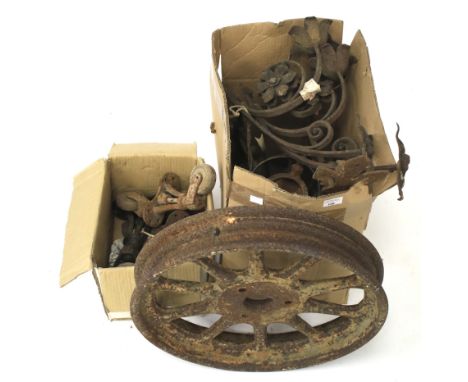 An assortment of vintage metalware. Including wheels, brackets etc.