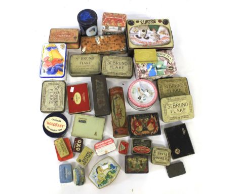 An assortment of vintage metal advertising tins. Including a Huntley and Palmer example modelled as a horse trough