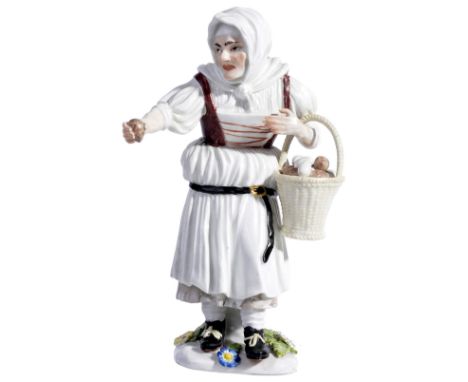 A MEISSEN FIGURE OF AN EGG-SELLER, CIRCA 1745modelled by Johann Joachim K„ndler (1706-1775), from the series of Parisian stre