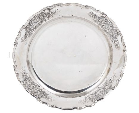 A GERMAN SILVER DISH, J.D. SCHLEISSNER UND SOEHNE, HANAU, CIRCA 1900shaped circular, the border with raised vignettes of an 1